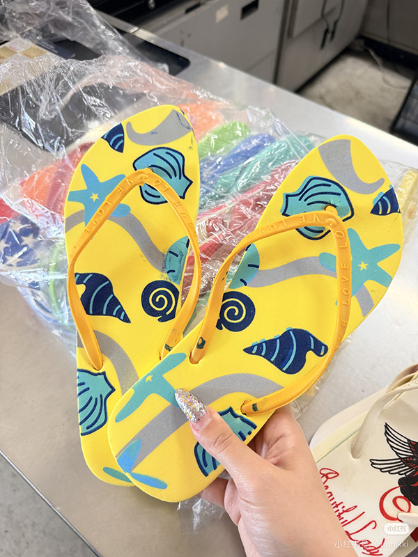 Summer Fashion Women’s Flip Flops Bulk Assortment - Comfortable Flat Sandals with US Flag, Ocean, and Floral Prints - Wholesale Liquidation Deal, Perfect for Retailers.